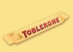 yellow triangle packaging with Toblerone written across it in red.